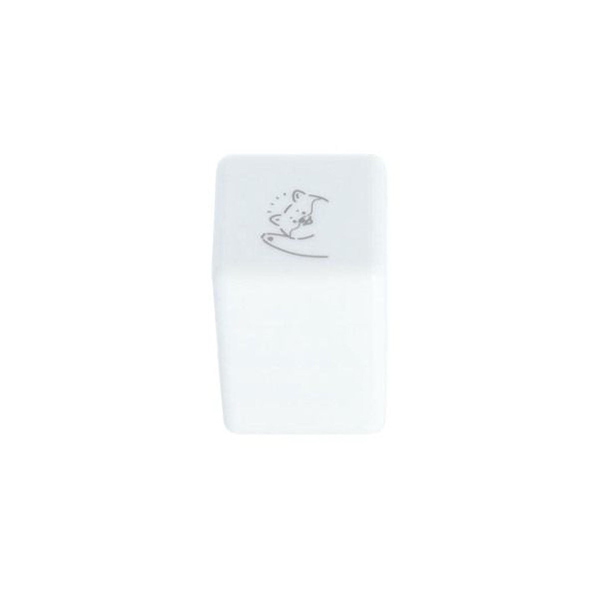 A white rectangular object with a small drawing or symbol on it.