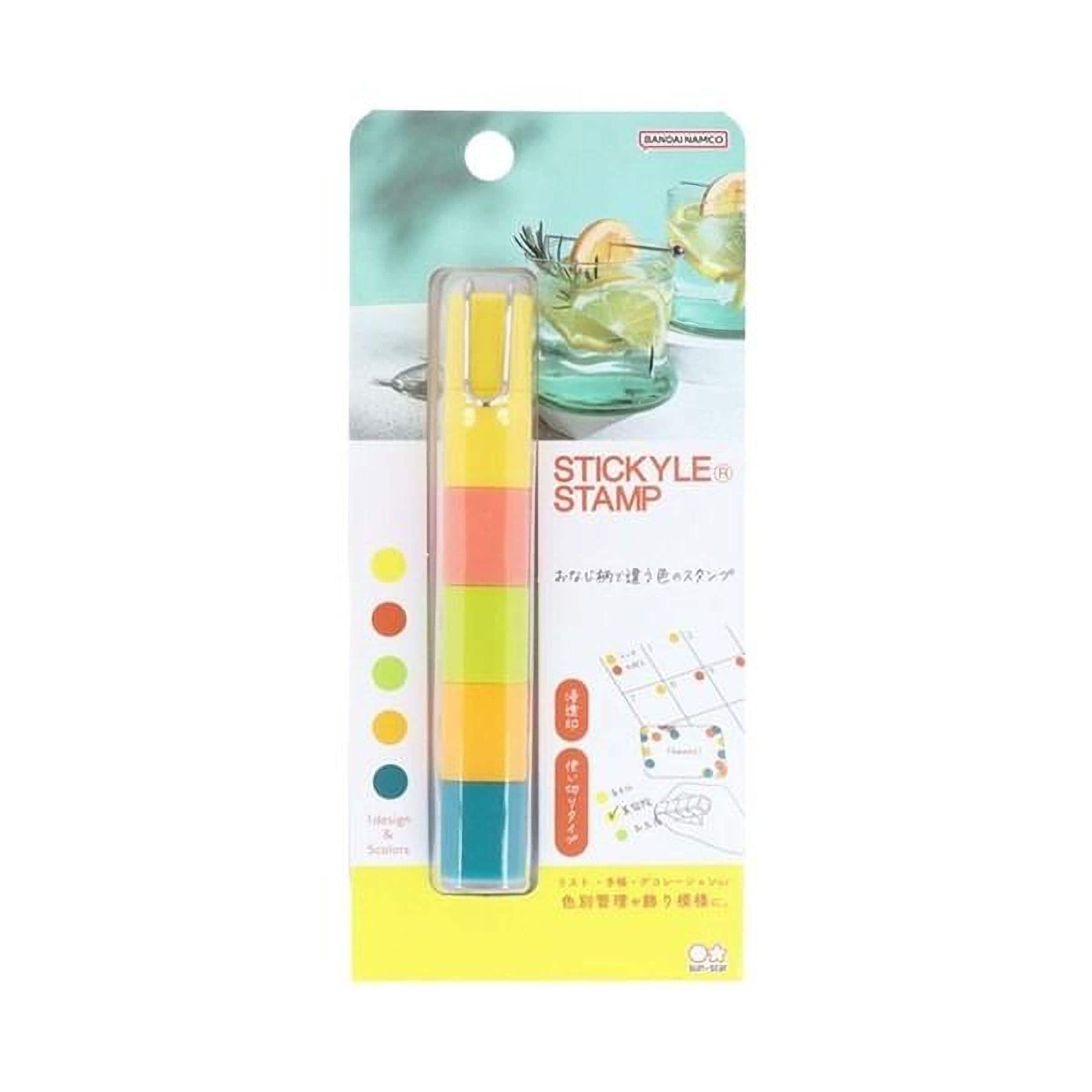 A colorful and vibrant stamp-like object with a design that includes a glass of lemonade and a straw. The product appears to be a multi-colored pen or marker with a unique design.