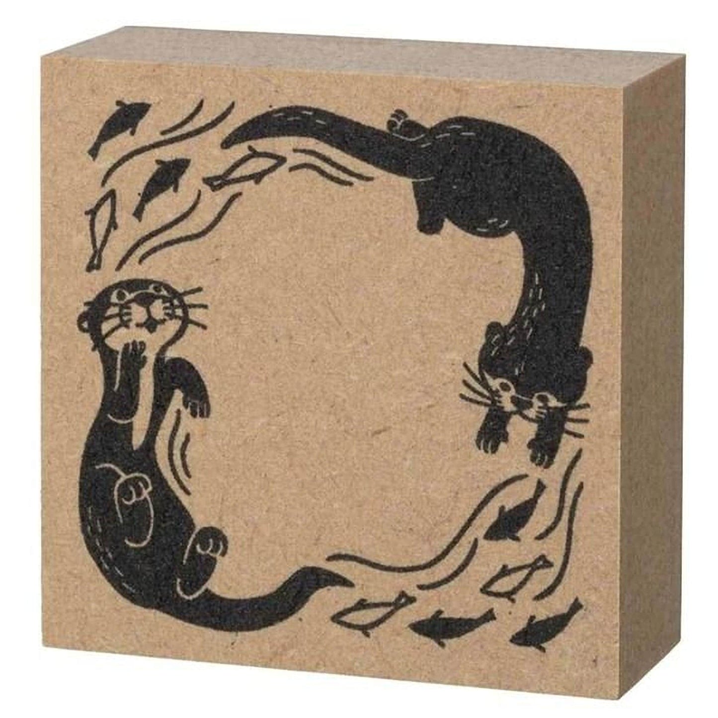 A square block with a black and white illustration of two otters swimming in a circular frame, surrounded by fish.