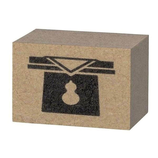 A block of brown cardboard with a black silhouette of a bird or similar symbol printed on it.
