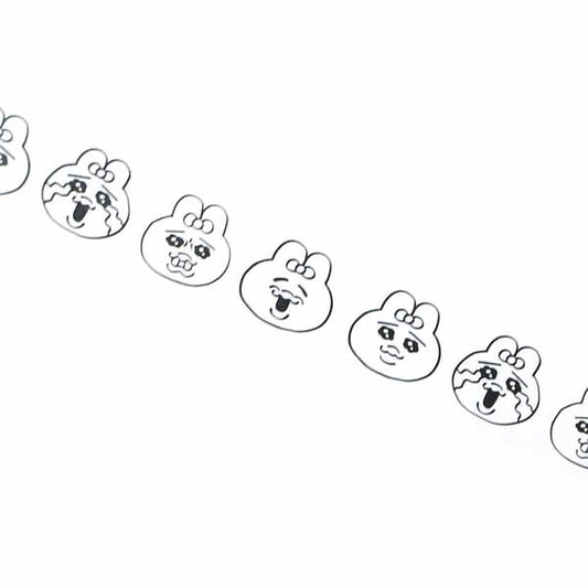 A row of simple black and white cartoon-style faces with exaggerated features, such as large eyes, big noses, and wide mouths, arranged in a diagonal line.