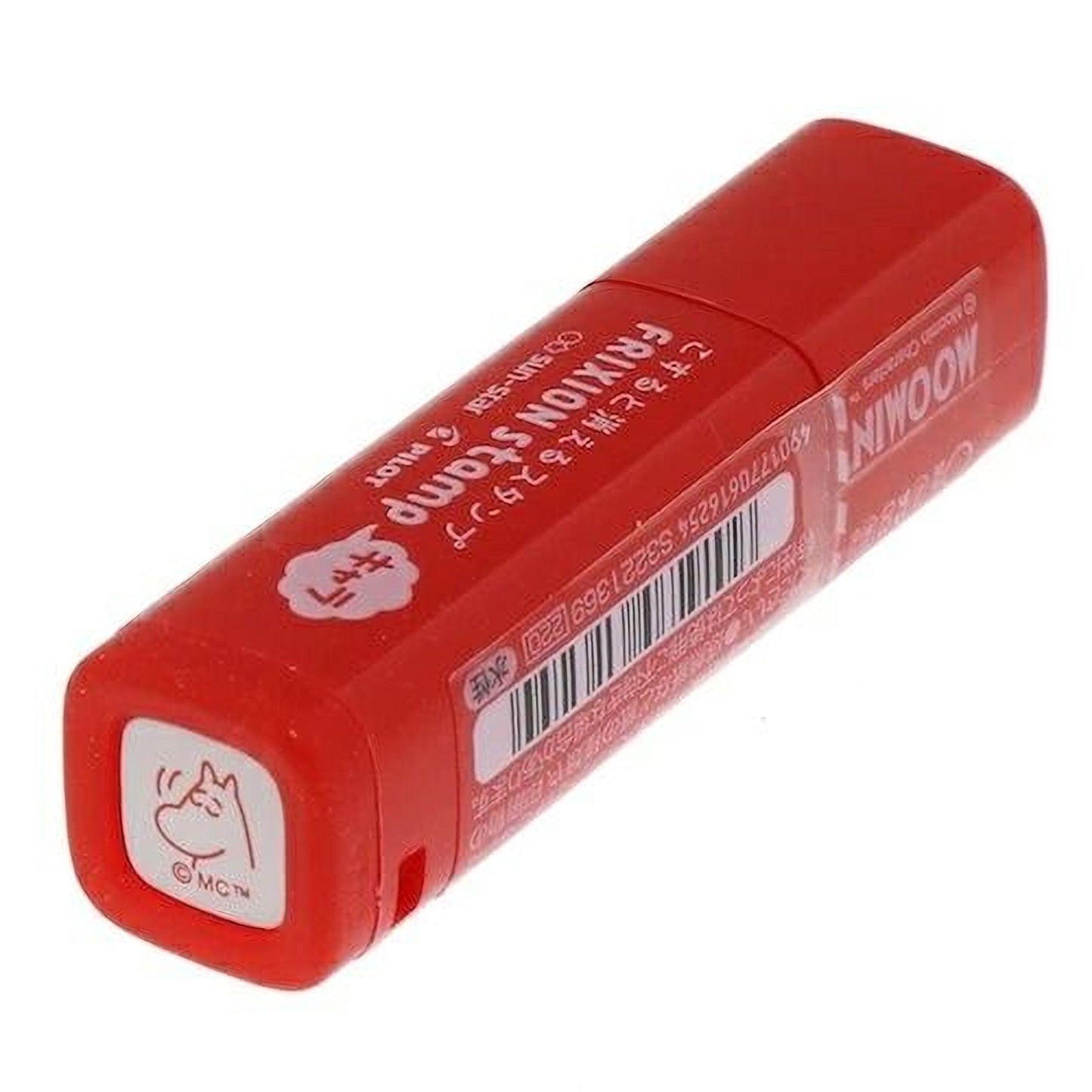 A red and white lipstick tube with a barcode and text in Japanese.