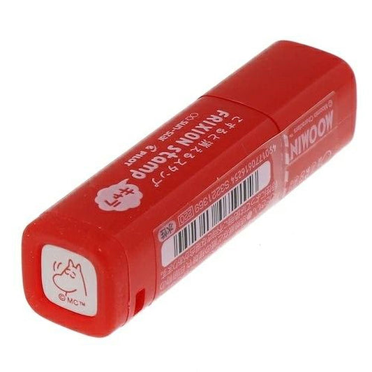 A red and white lipstick tube with a barcode and text in Japanese.