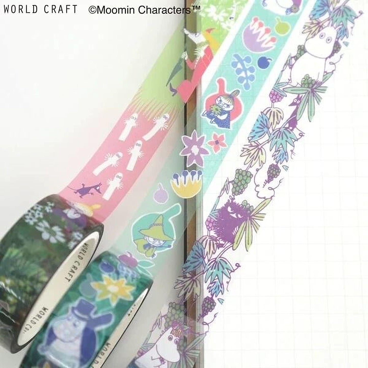 a collection of colorful and patterned tape rolls, including one with a cartoon character design.