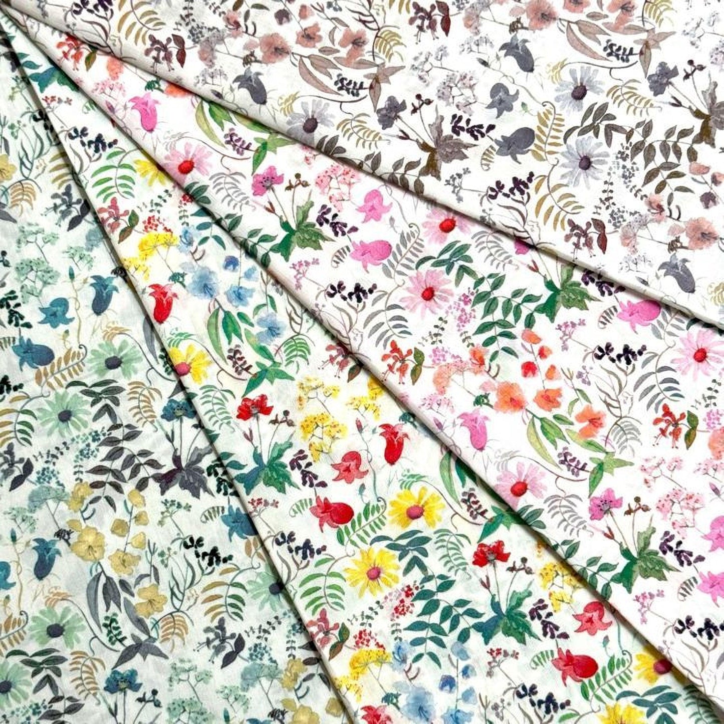 The image is a collage of various fabric swatches with different floral and leaf patterns, including a variety of colors and designs.