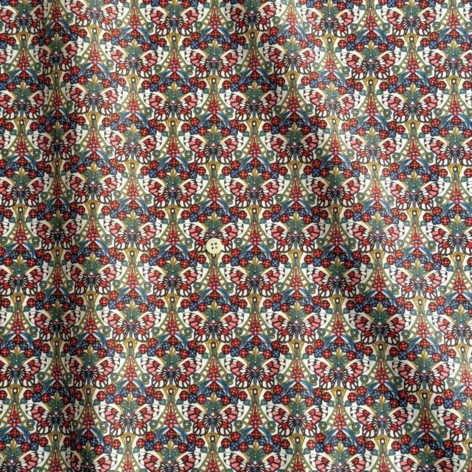 a repeating pattern of a floral design in various colors, including red, green, yellow, and blue. The pattern is intricate and detailed, creating a visually striking and vibrant design.
