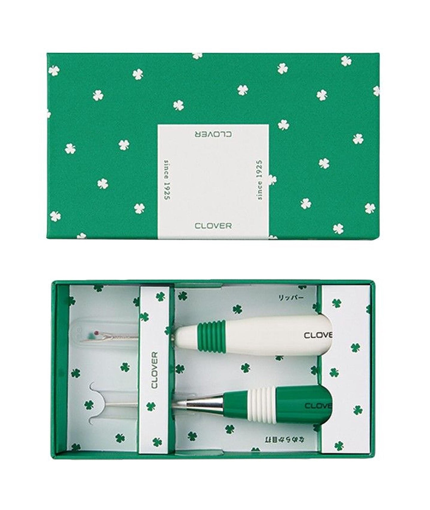 a set of green and white clover-themed items, including a green and white box with clover designs, a green and white screwdriver, and a green and white pen.