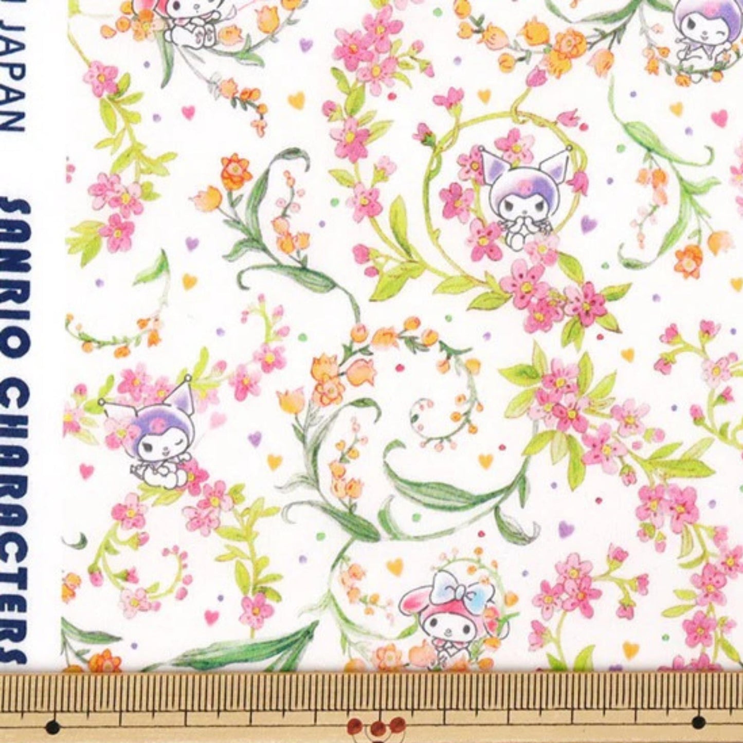 a repeating pattern of pink flowers and green leaves, along with small cartoon-like characters. The pattern is spread across a white background, creating a visually appealing and colorful design.