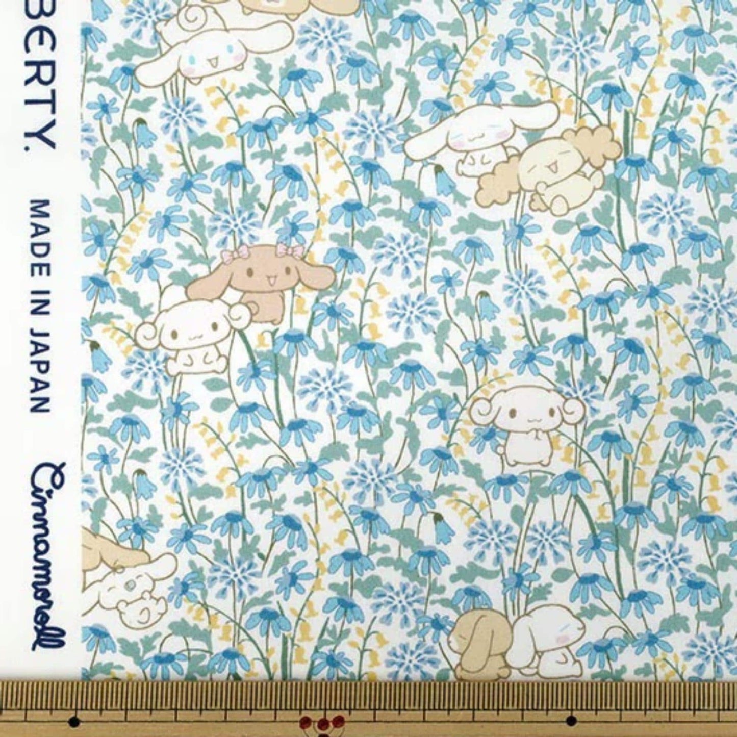 a pattern of cartoon-style animals, including rabbits and dogs, set against a background of blue flowers. The pattern is designed in a playful and whimsical style, with the animals and flowers arranged in a visually appealing manner.