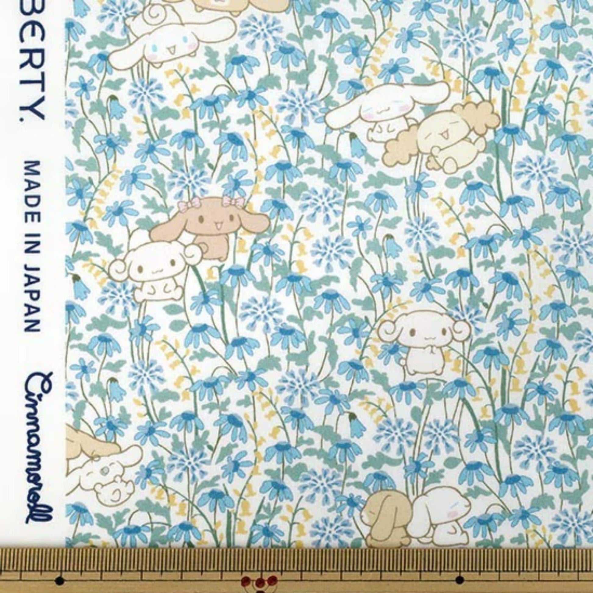 a pattern of cartoon-style animals, including rabbits and dogs, set against a background of blue flowers. The pattern is designed in a playful and whimsical style, with the animals and flowers arranged in a visually appealing manner.