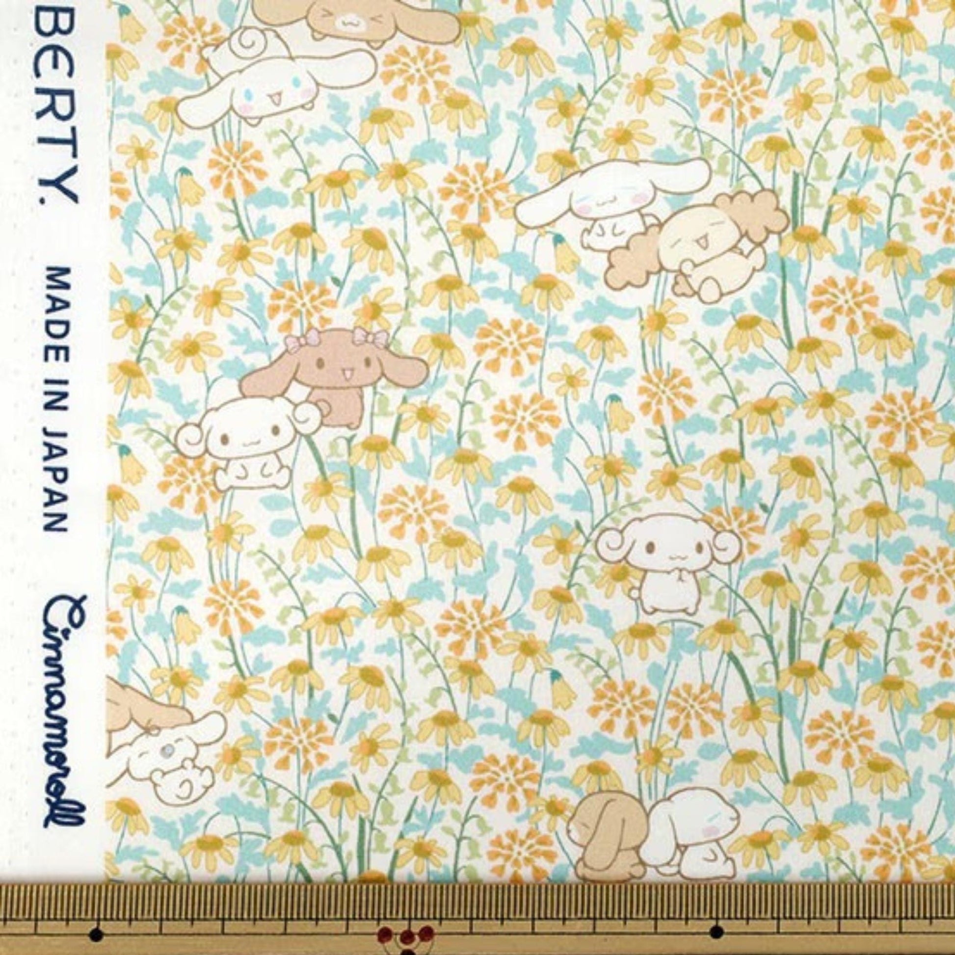 a fabric with a dog and flowers on it