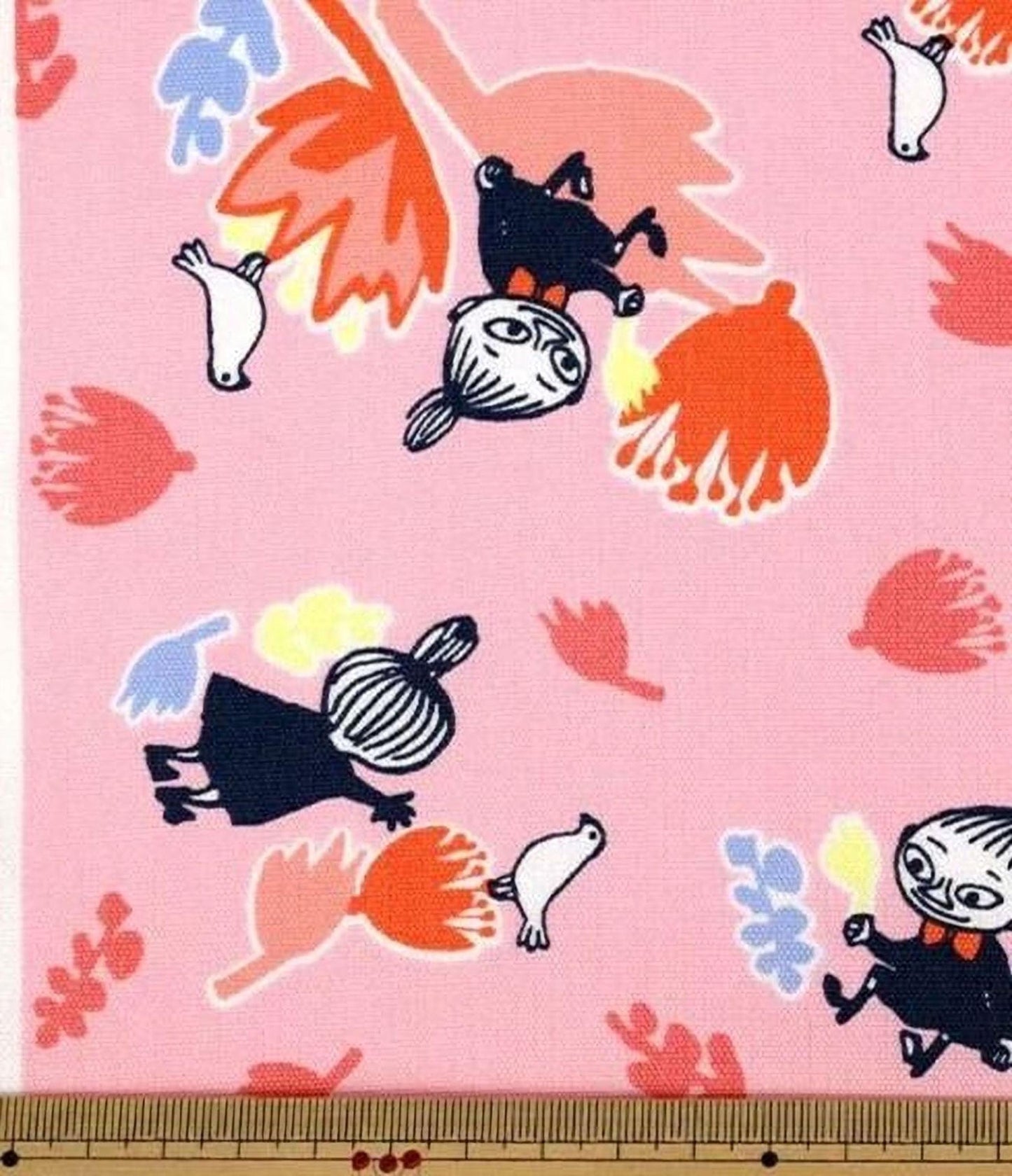 The image is a vibrant and playful collage featuring a variety of cartoon-style characters and floral patterns in shades of pink, orange, and blue.