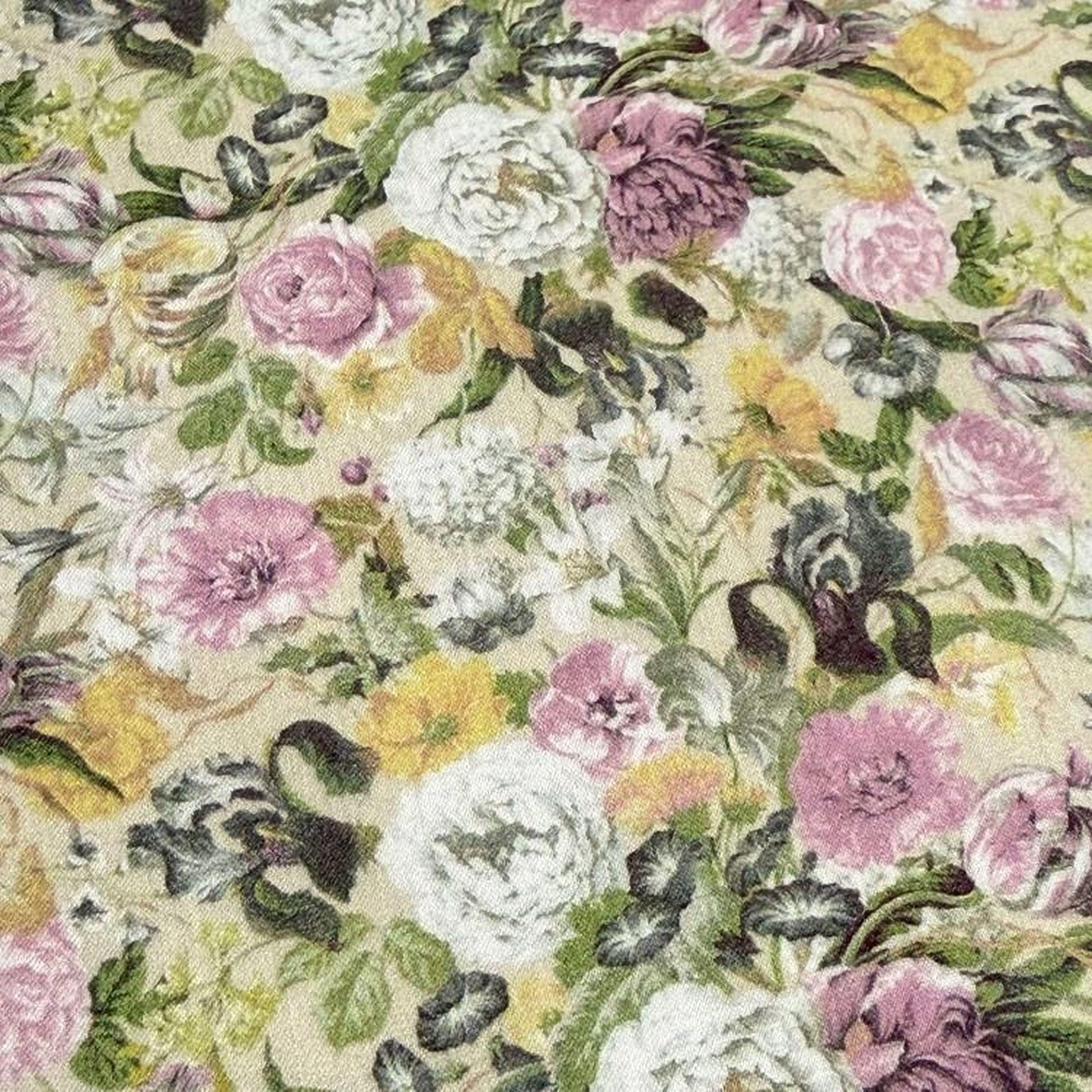 The image is a close-up of a fabric with a floral pattern, featuring a variety of colorful flowers and leaves in shades of pink, white, and green.