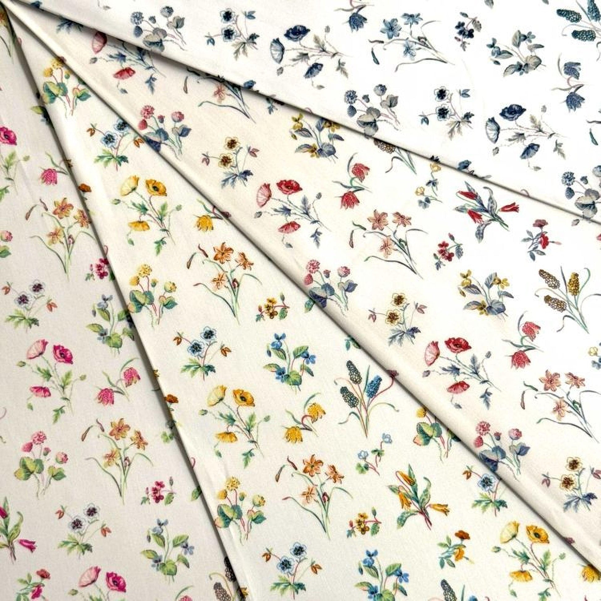 The image is a collage of various floral patterns, including different types of flowers and leaves, arranged in a visually appealing manner.