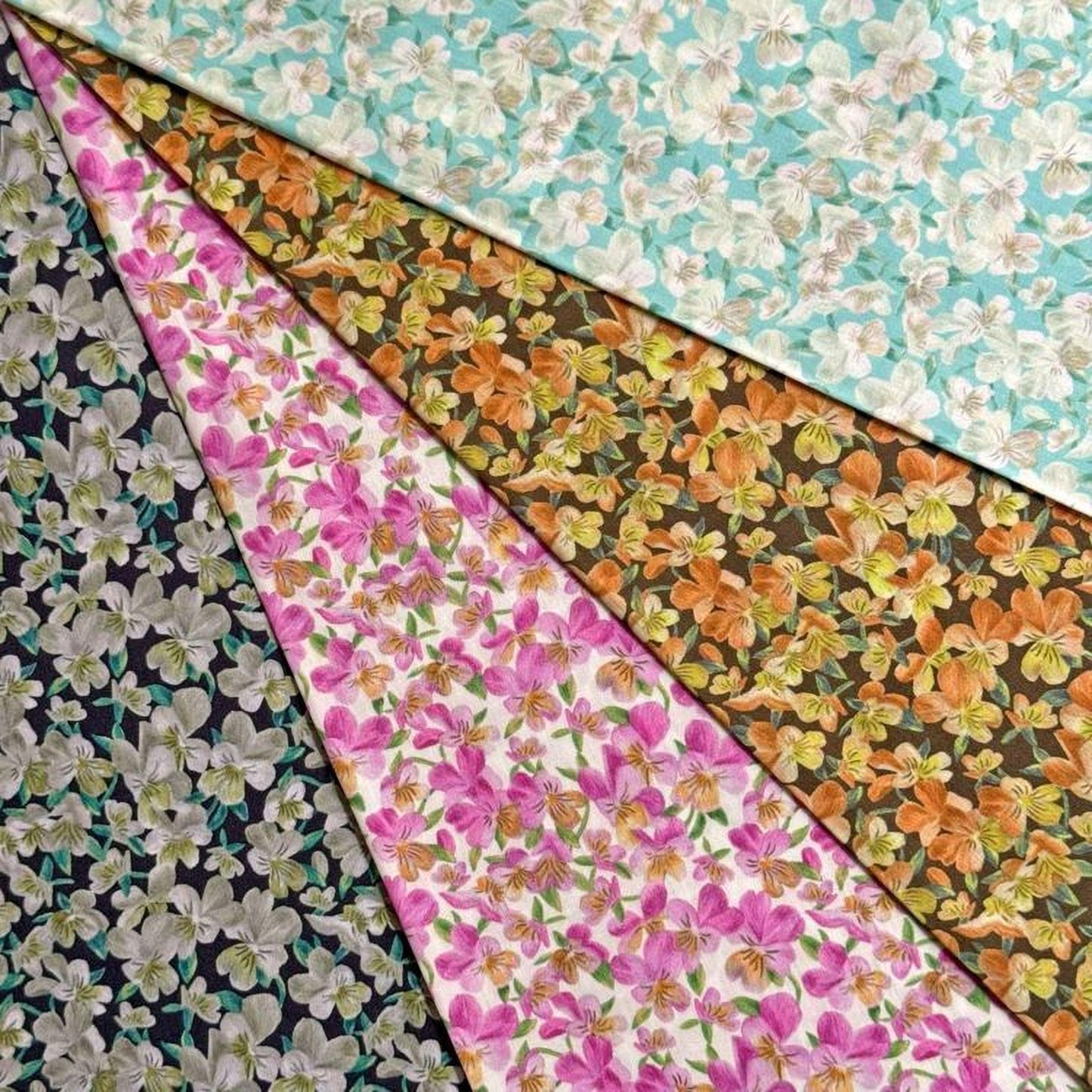 The image is a collage of five fabric swatches, each featuring a different floral pattern in various colors such as pink, orange, and green.