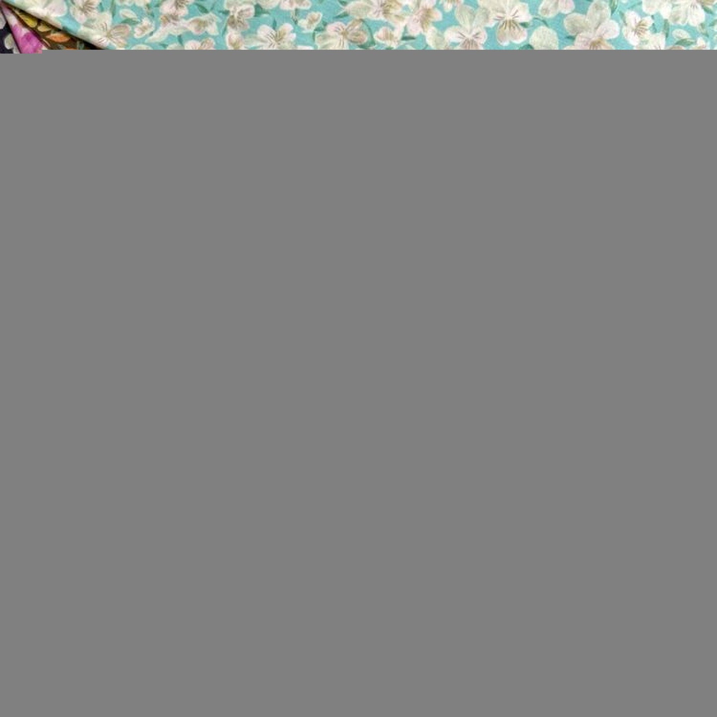 The image is a collage of five fabric swatches, each featuring a different floral pattern in various colors such as pink, orange, and green.
