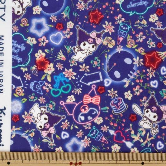 The image is a vibrant and colorful fabric print featuring various cartoon-like characters and floral patterns in shades of blue, purple, and pink.