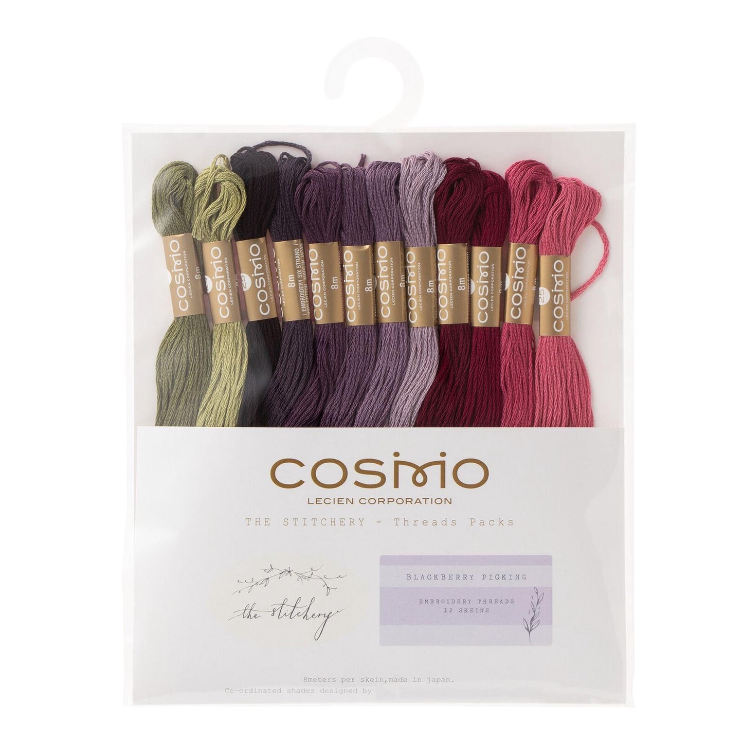 a package of embroidery thread in various colors, including green, purple, pink, and red, arranged in a row.