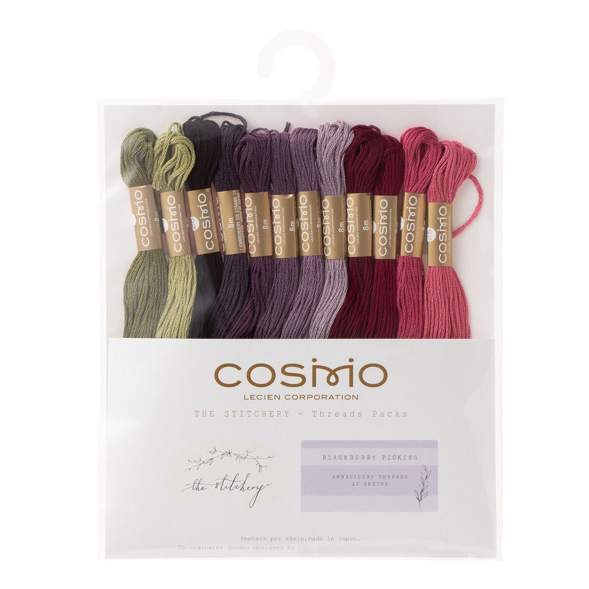 a package of embroidery thread in various colors, including green, purple, pink, and red, arranged in a row.