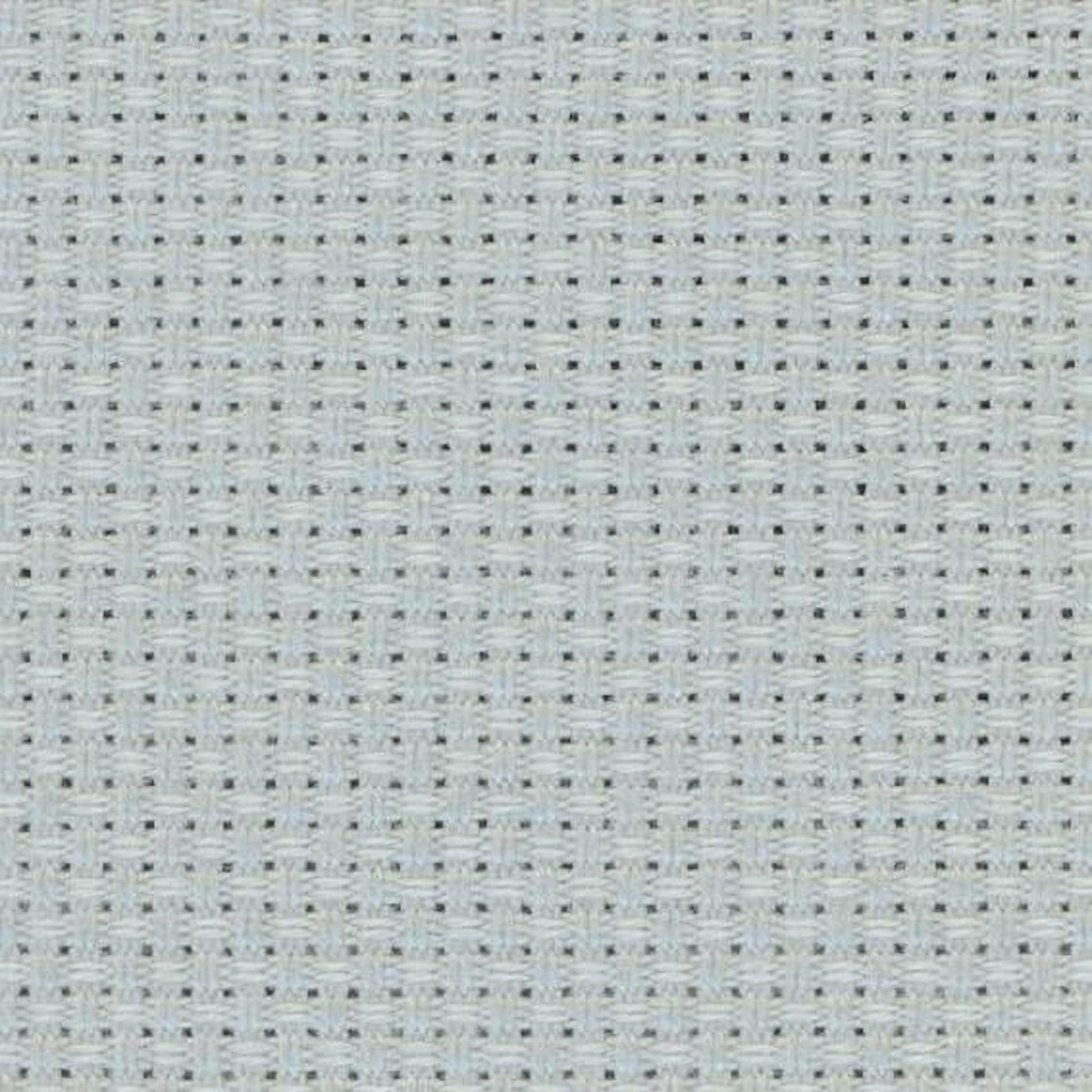 The image is a close-up of a light blue fabric with a grid-like pattern of small squares or dots, creating a textured and woven appearance.