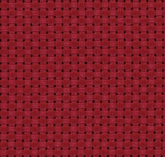 a close-up view of a red fabric with a woven pattern, featuring small squares or rectangles arranged in a grid-like pattern.
