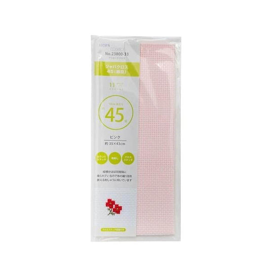 a package of cross-stitch fabric, specifically a pink fabric with a floral pattern.