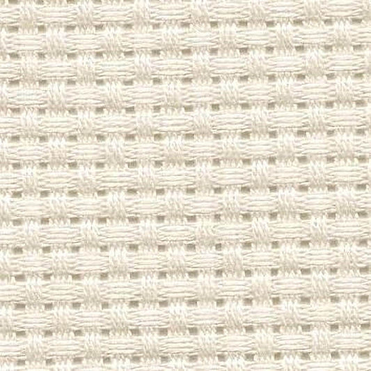 a close-up view of a white woven fabric with a repeating pattern of small squares or rectangles, creating a grid-like texture.