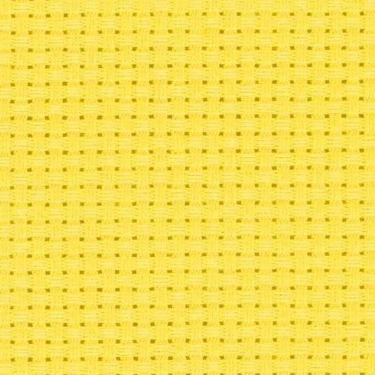 The image is a close-up of a yellow woven fabric with a repeating pattern of small squares or rectangles.