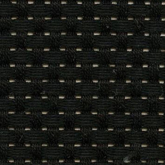 a close-up view of a black woven fabric with a repeating pattern of small white squares or rectangles.