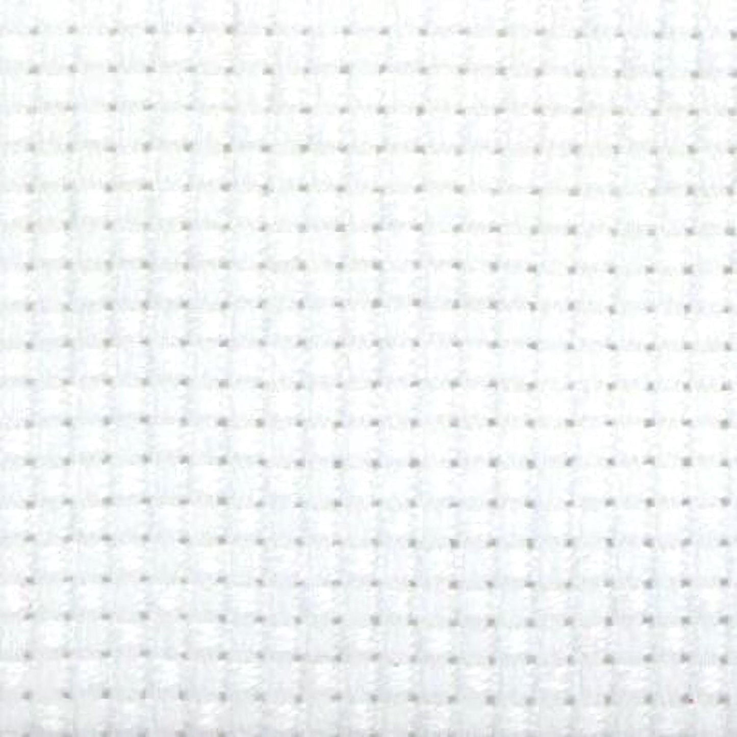The image is a close-up of a white fabric with a grid-like pattern of small squares or dots.
