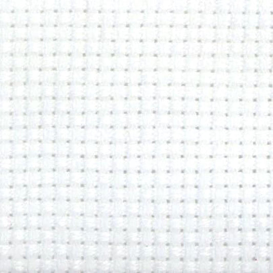 The image is a close-up of a white fabric with a grid-like pattern of small squares or dots.
