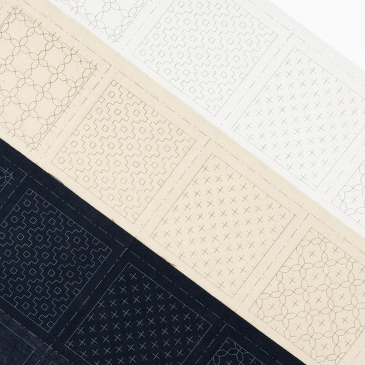 The image is a collage of three different patterns, each with a unique design and color scheme. The patterns include a black and white geometric design, a beige geometric design, and a black and white floral design. The patterns are arranged in a diagonal line, creating a visually striking and dynamic composition.