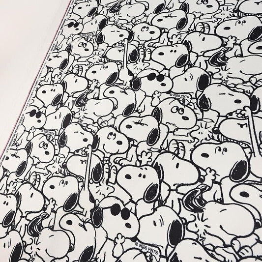 The image is a collage of multiple black and white images depicting the cartoon character Snoopy.