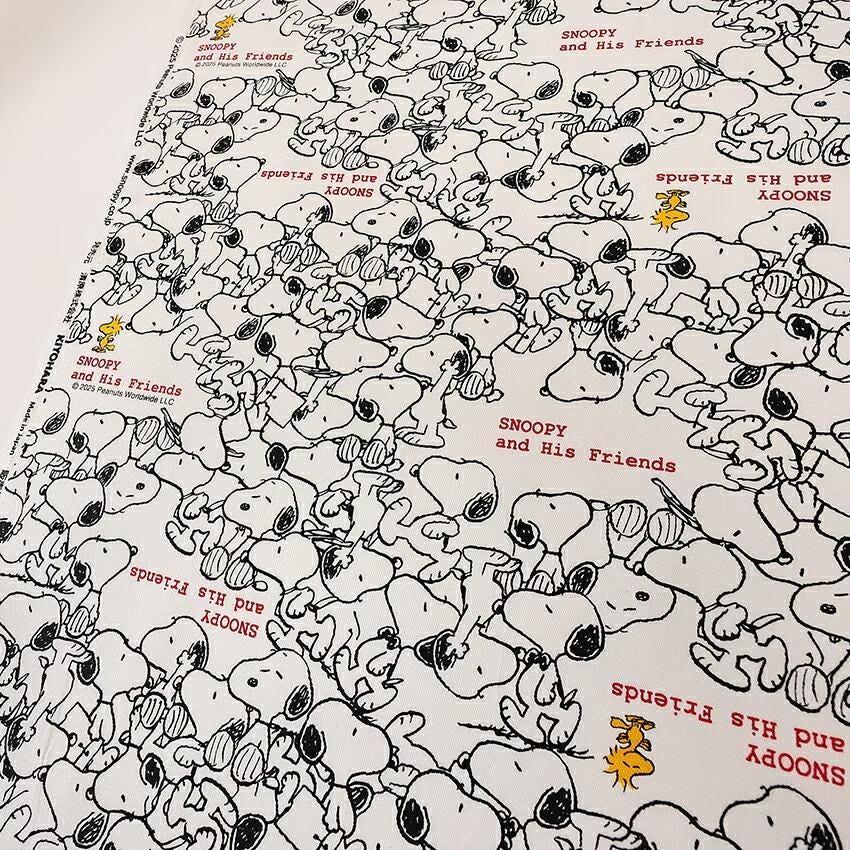 The image is a collage of multiple images featuring the character Snoopy and his friends. The images are arranged in a repeating pattern, creating a visually cohesive and engaging design.