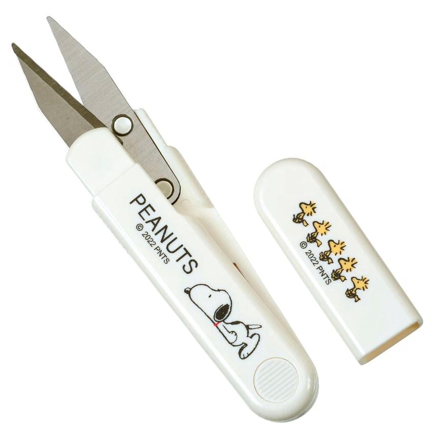 A pair of scissors with a Peanuts-themed design, featuring the character Snoopy.
