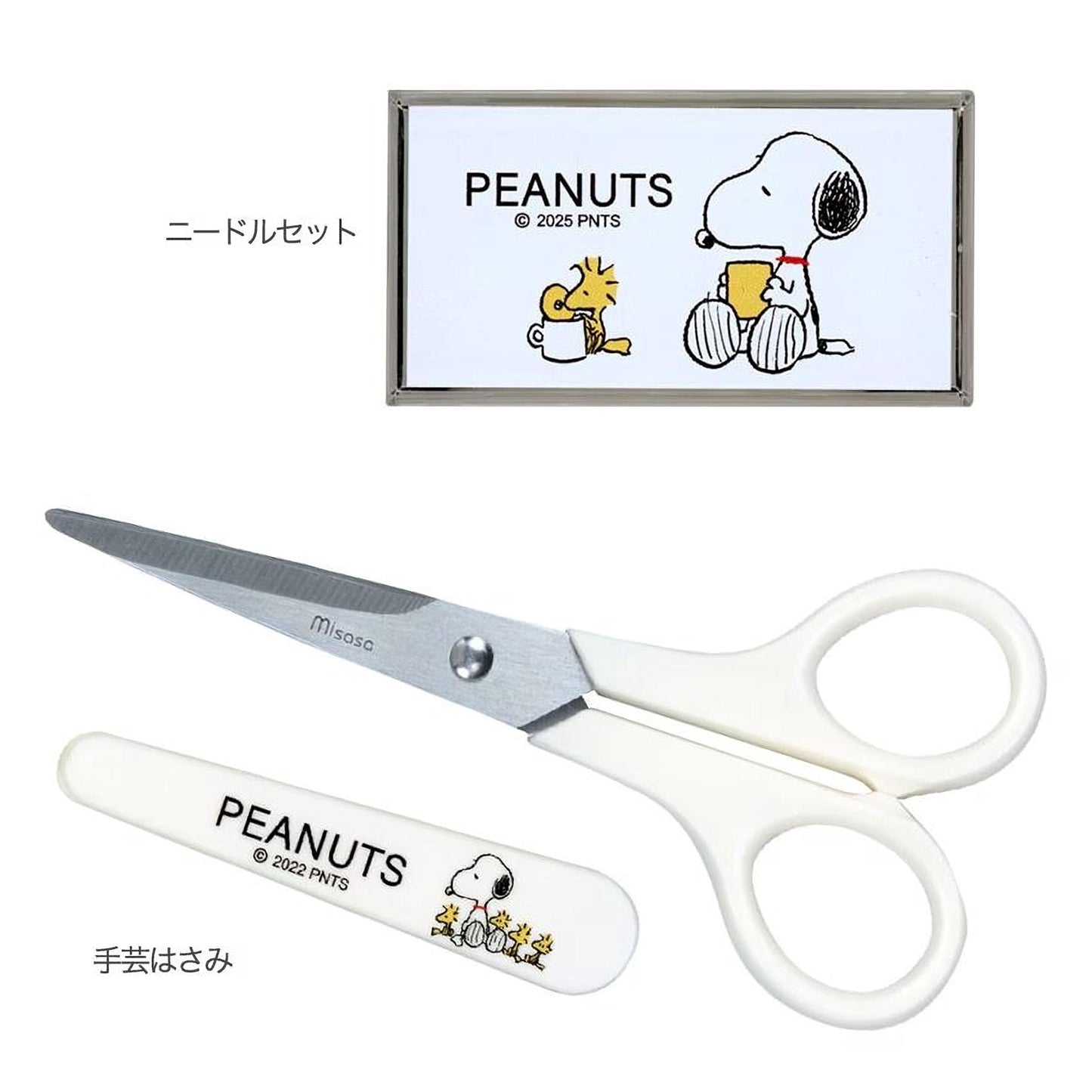 a pair of scissors and a nail file with a Peanuts theme, featuring Snoopy and Woodstock from the Peanuts comic strip.