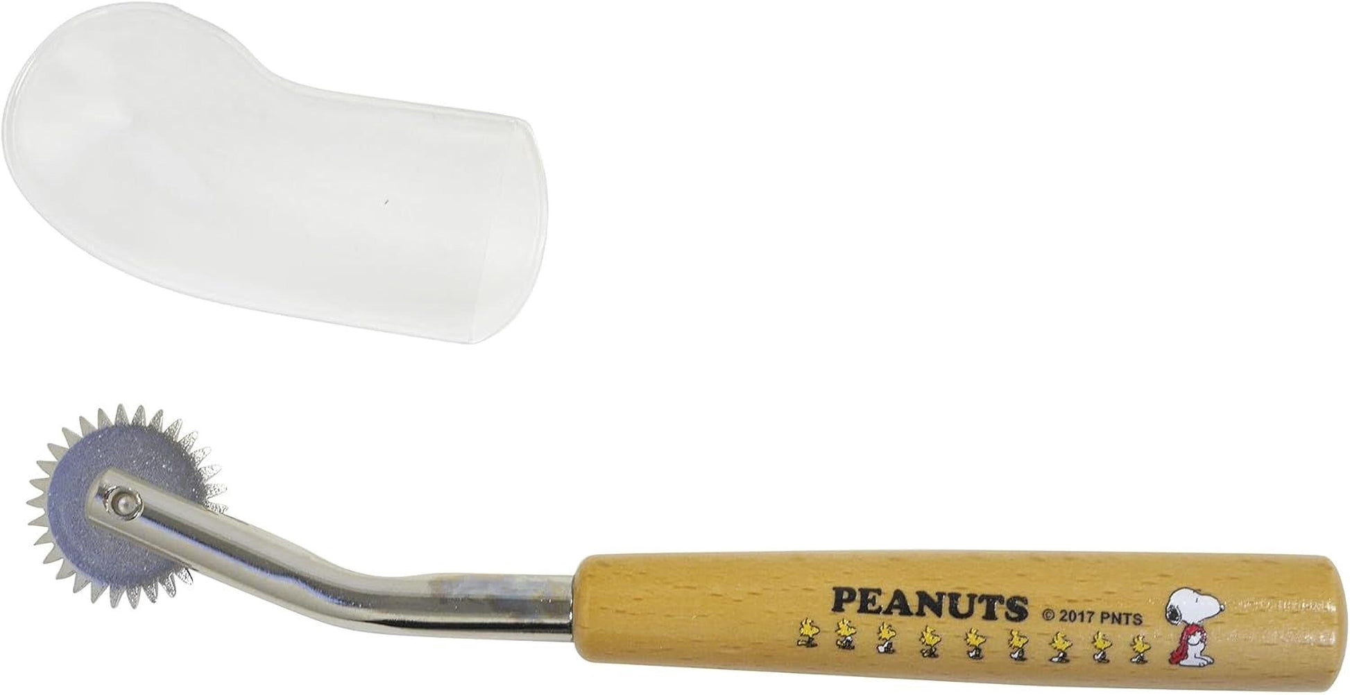 A Peanuts themed rolling pin with a wooden handle and a clear plastic cover.