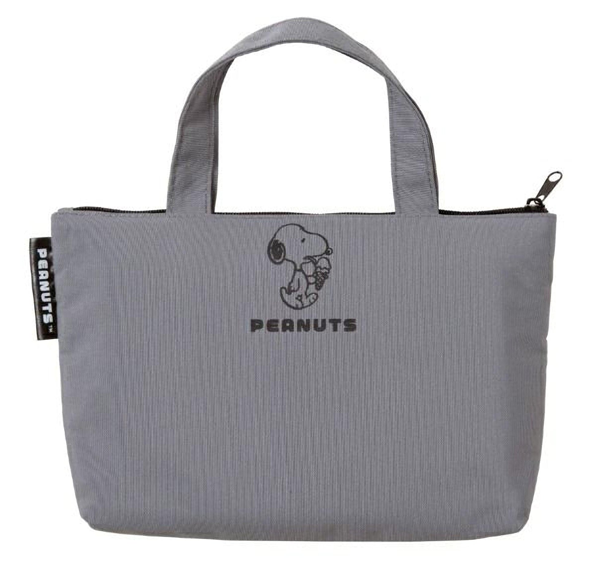 A gray tote bag with a Peanuts logo printed on it.