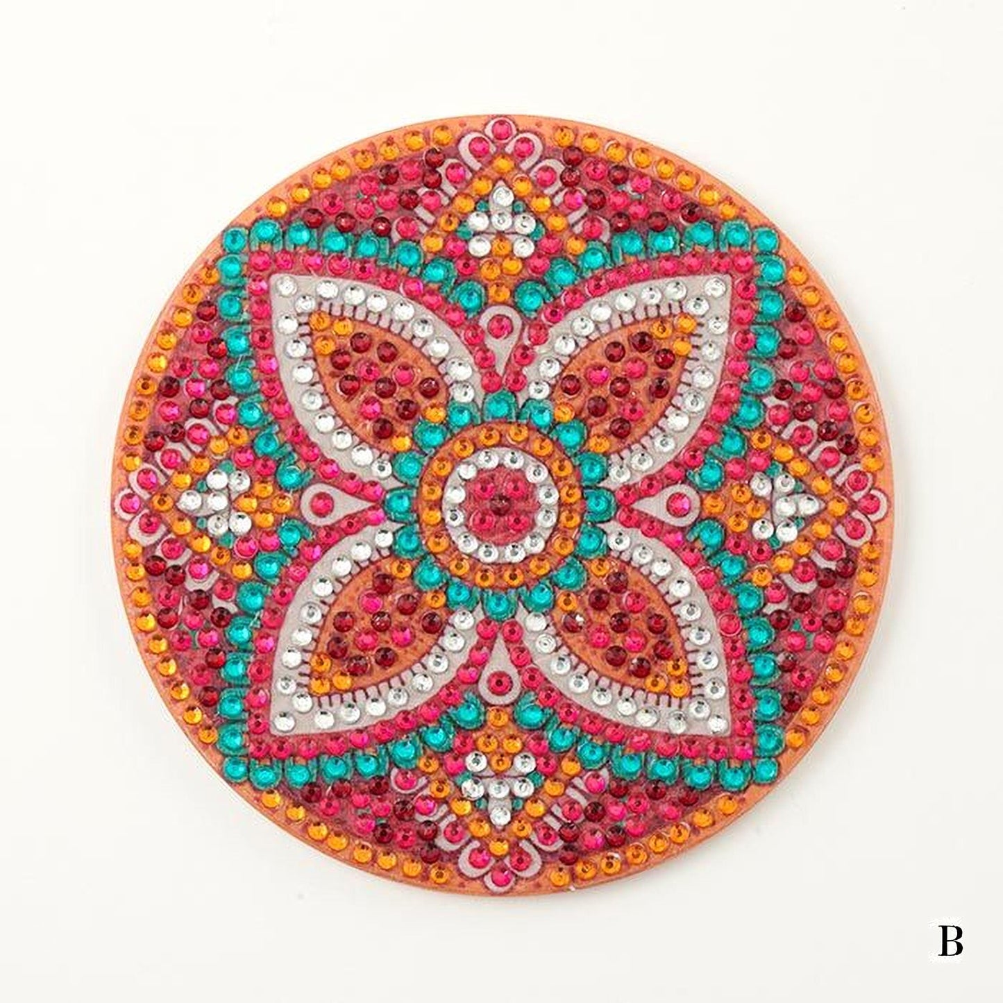 a circular, ornate piece of jewelry or decoration with a vibrant, colorful design. The design is composed of various shapes, including flowers and geometric patterns, and is adorned with numerous small, colorful beads or stones. The overall appearance of the piece is visually striking and eye-catching.