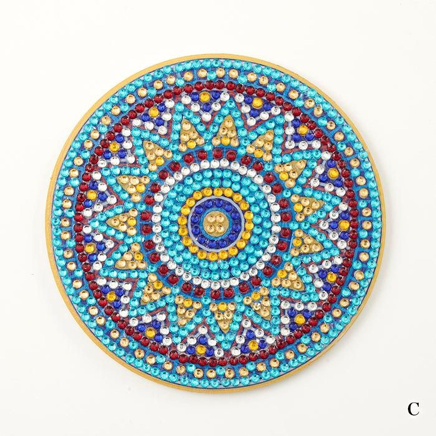 A colorful, intricate design featuring a central motif surrounded by a border of various colored beads and stones.