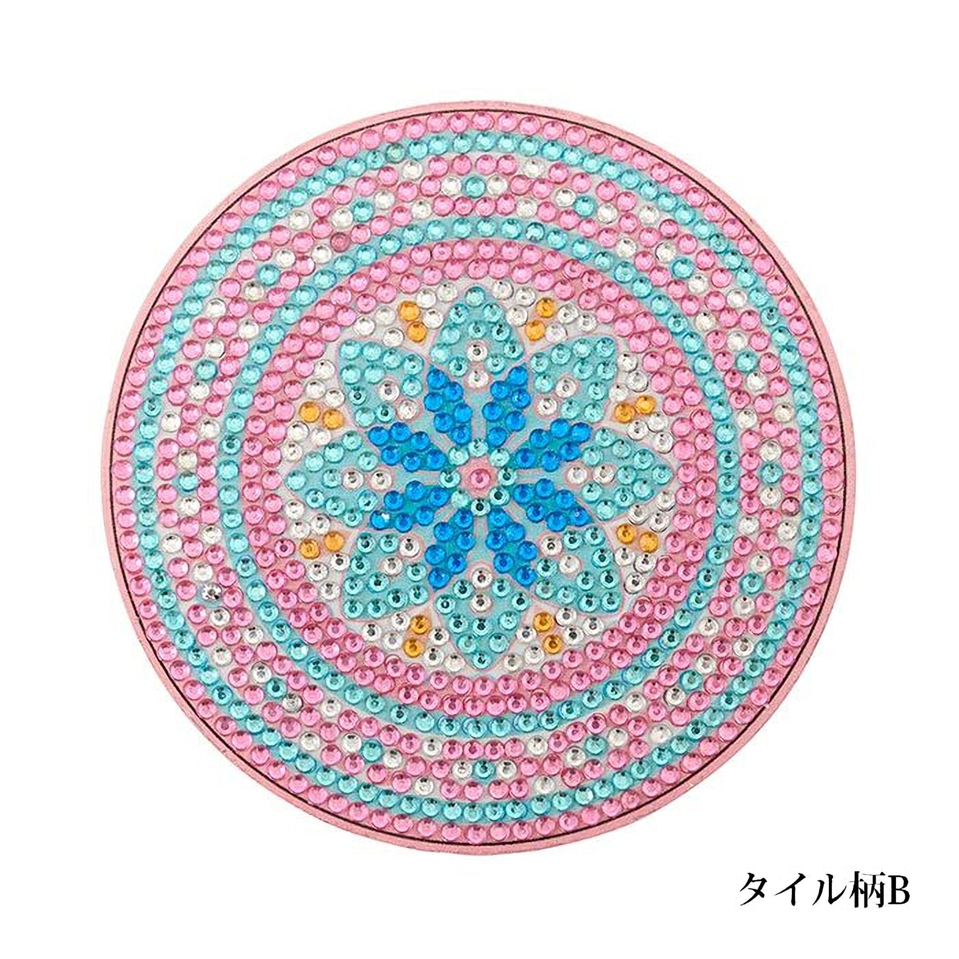 A circular design made of colorful beads, featuring a blue flower-like motif at the center.