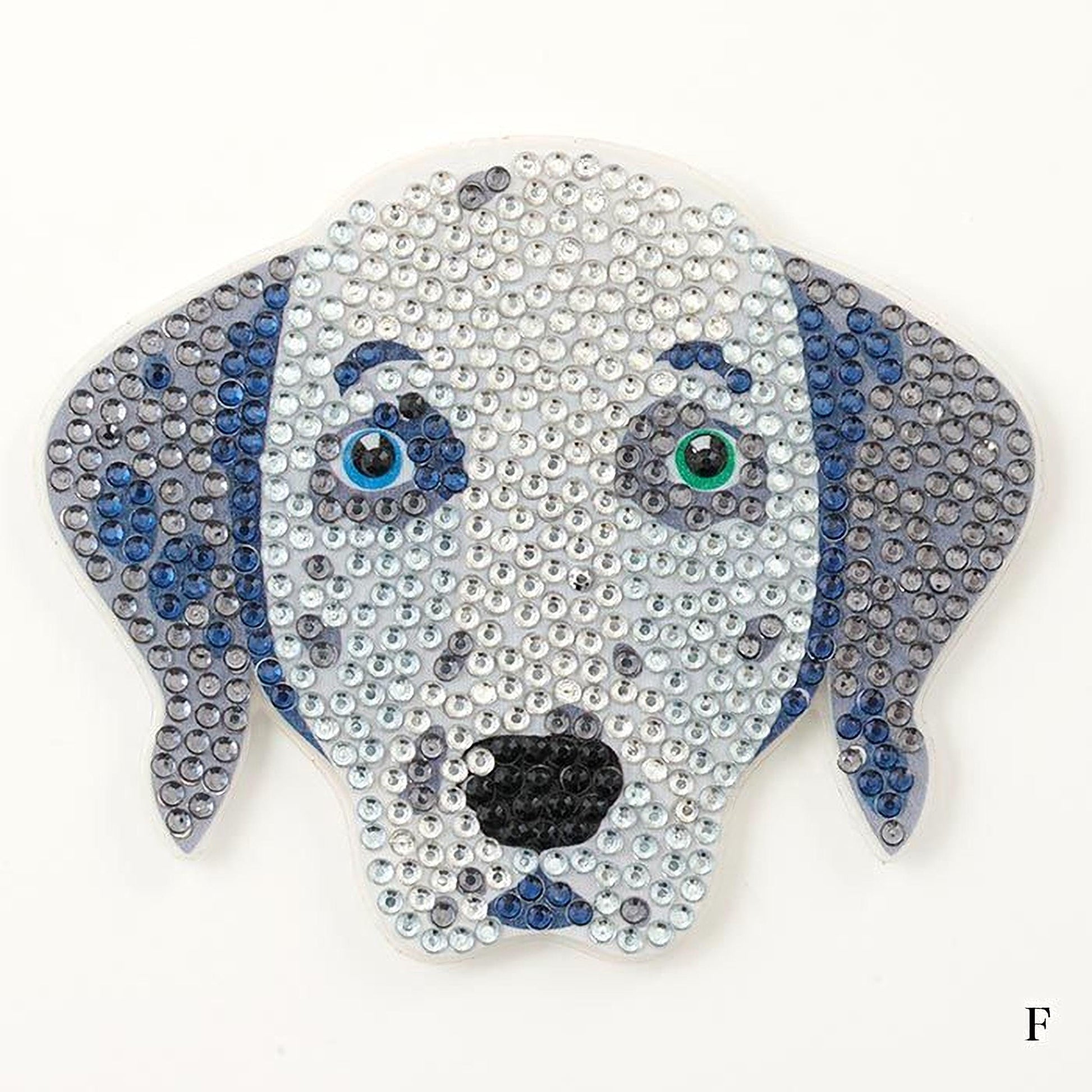 A close-up of a Dalmatian dog head made of small, clear rhinestones in various shades of gray, blue, and black.