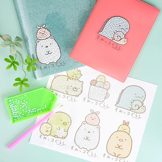 a collection of colorful, cartoon-style animal illustrations, including a bear, a cat, a dog, and a turtle, along with a pink notebook and a green magnifying glass.
