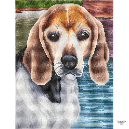 The image is a detailed embroidery depicting a beagle dog with a black nose and brown ears, looking directly at the viewer.