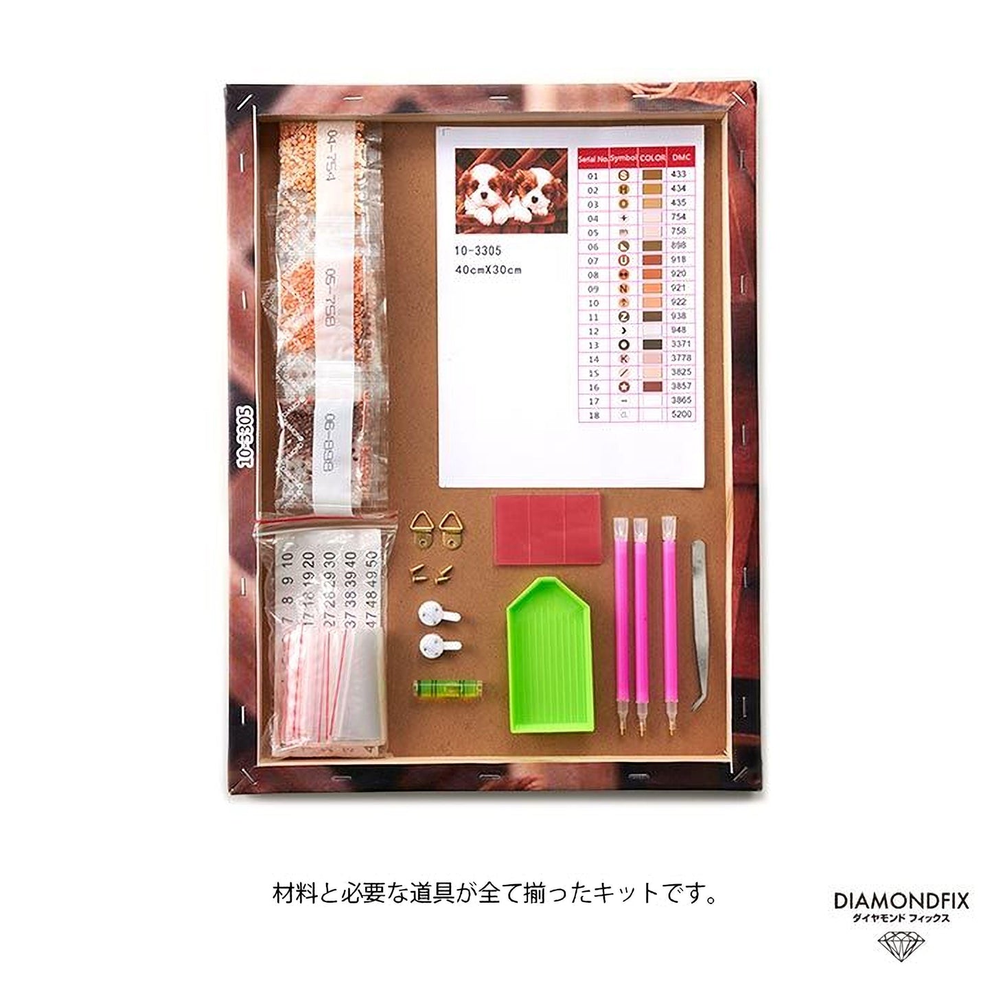 various craft supplies and tools, including pens, scissors, and other materials, arranged in a box.