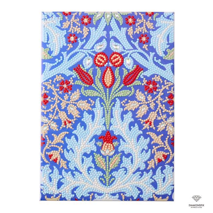 a vibrant and intricate floral pattern with red and white flowers, leaves, and other decorative elements against a blue background.