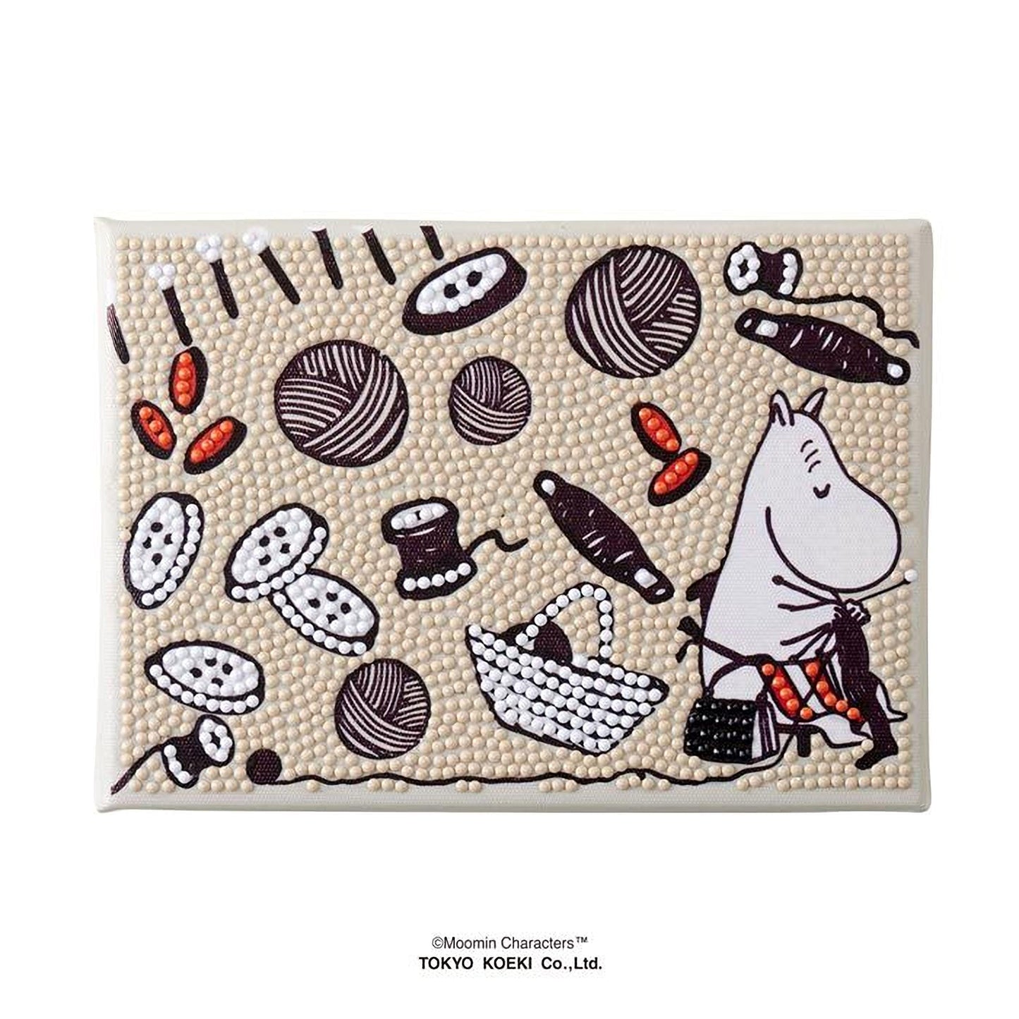 The image is a collage of various embroidered and bead designs, including a character, buttons, yarn, and other decorative elements.