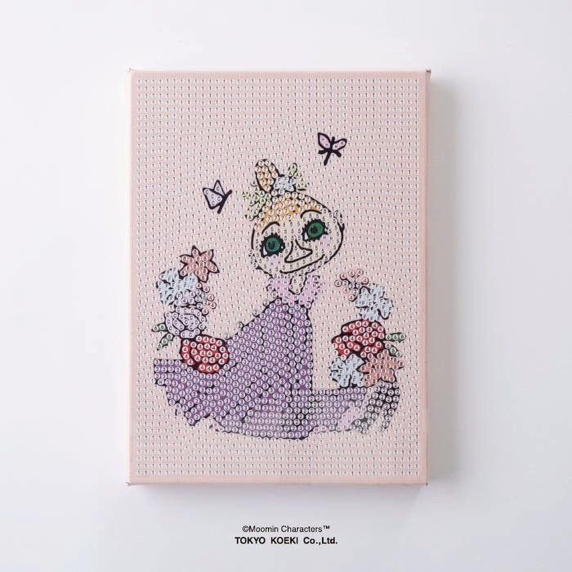The image is a pink canvas featuring a cartoon-like illustration of a girl with a flower crown and butterflies.