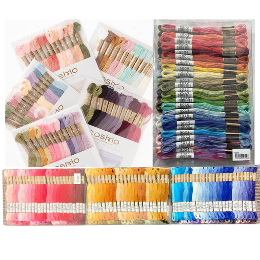 a variety of colorful embroidery floss and thread packages, including different shades of pink, blue, green, yellow, and purple.