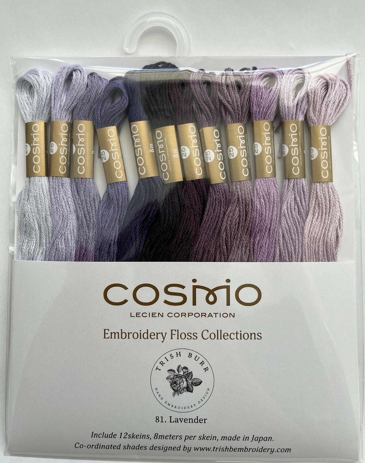 a package of embroidery floss in various shades of lavender, including light purple, dark purple, and a darker shade of lavender. The package is labeled as a "Cosimo Embroidery Floss Collection" from the "Trish Burr Hand Embroidery Design" brand, and it includes 12 skeins of the product, each measuring 8 meters in length. The package also mentions that the floss is made in Japan and includes hand-coordinated shades designed by the website www.trishembrodery.com.